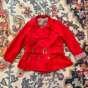Cute red rain coat with belt.